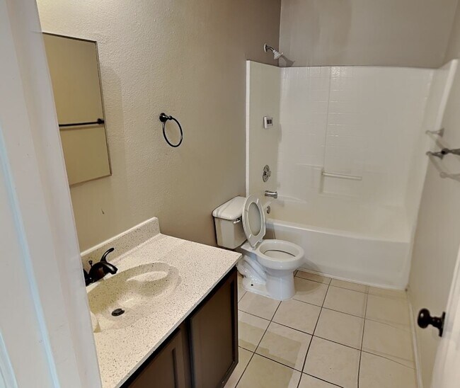 Building Photo - Corner Lot Charmer with Two-Story Deck and Bonus Game Room!