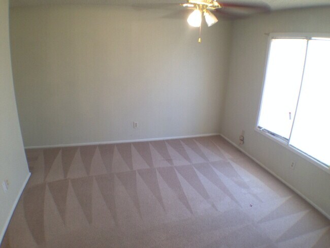 Building Photo - Two Story Condo In Whisperwood Located Nea...