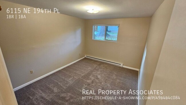 Building Photo - Quiet Apartment in Kenmore *Covered Parkin...