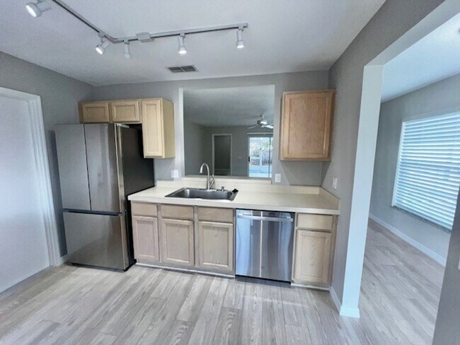 Building Photo - Welcome Home! Updated flooring & fresh interior paint! Move in OCTOBER! Beautiful 3X2 with attach...