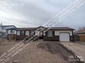 Building Photo - Spacious 5-Bedroom Rancher with Finished B...