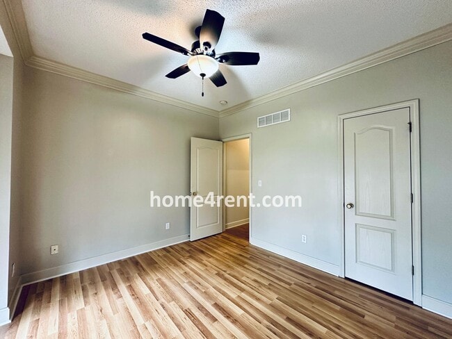 Building Photo - Maintenance Free! Main level Master, Finished Basement and Wood Floors in the Kitchen! *Brand New...