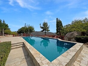 Building Photo - Hilltop Retreat with Pool, Garden & Panora...