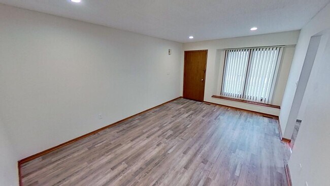 Building Photo - Updated 2BR/1BA duplex with office in partially finished basement, detached garage and across fro...