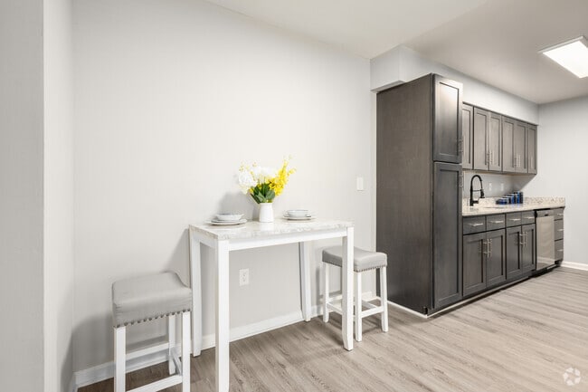 Renovated 2BR - Dining Area - The Charleston