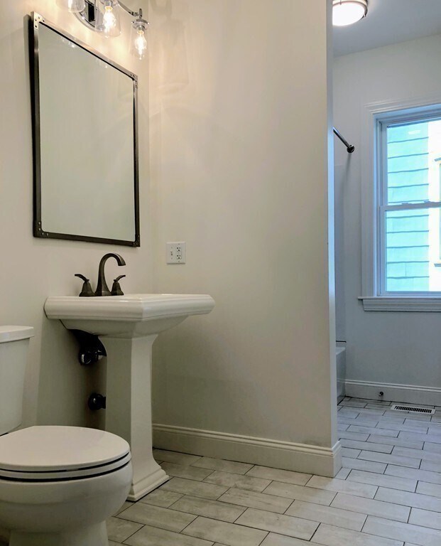 Building Photo - 10-12 Wolcott St