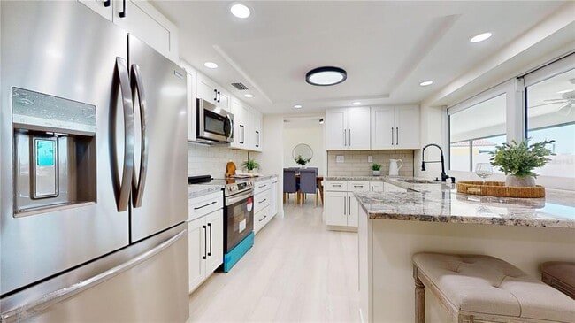 Building Photo - 6380 3rd Palm Point