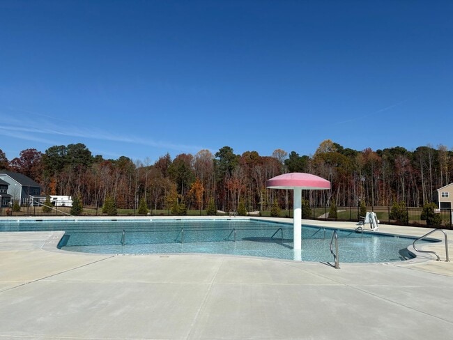 Building Photo - Beautiful 3 Bed+Bonus+2 Car Garage Townhome in New Wake Forest Community