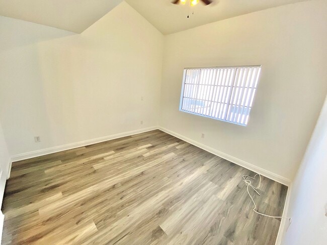 Building Photo - CONDOMINIUM IN A GATED COMMUNITY WITH 2 BE...