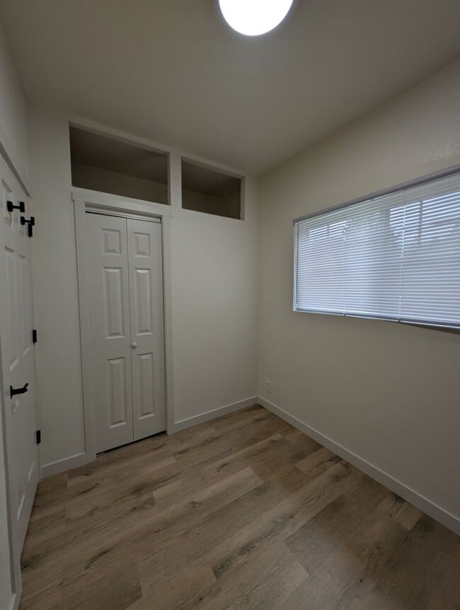 Building Photo - Adorable Four Bedroom w/ Fenced Yard Avail...