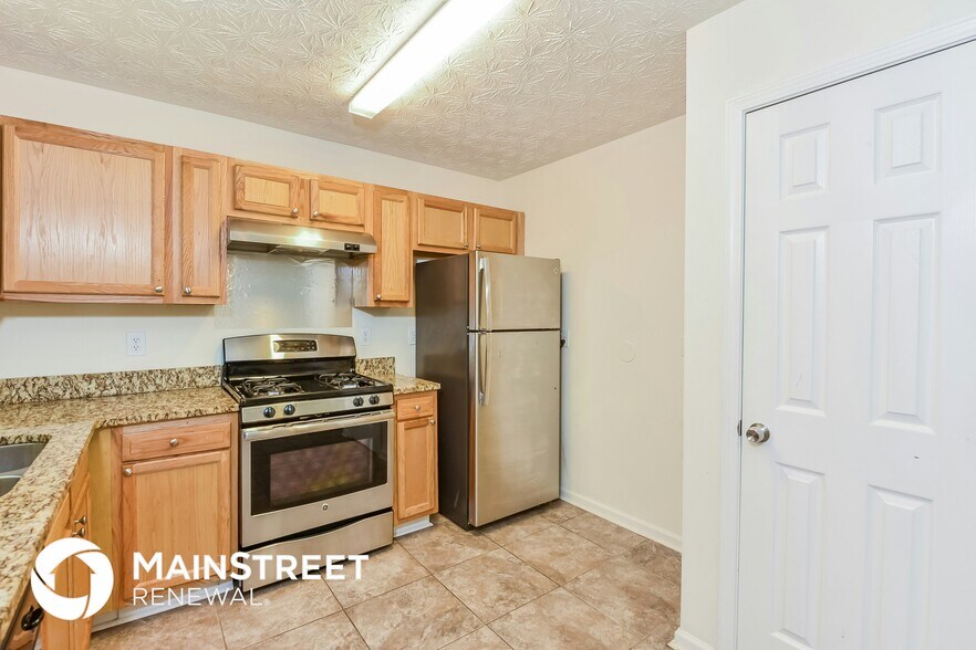 Building Photo - 3552 6 Oaks Ct