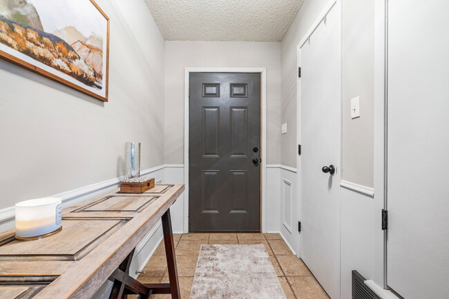 Spacious entry way with a large walk in closet to the right. - 209 Prairie Wind Blvd