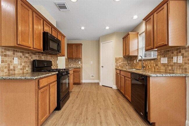 Building Photo - 8907 Grand Villa Ln