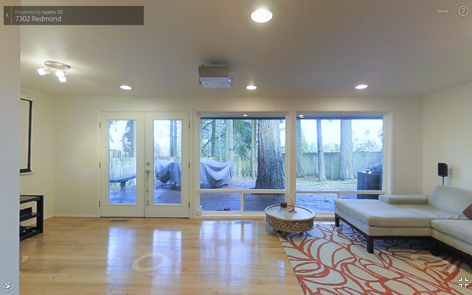 Living room with large windows - 7302 139th PL NE