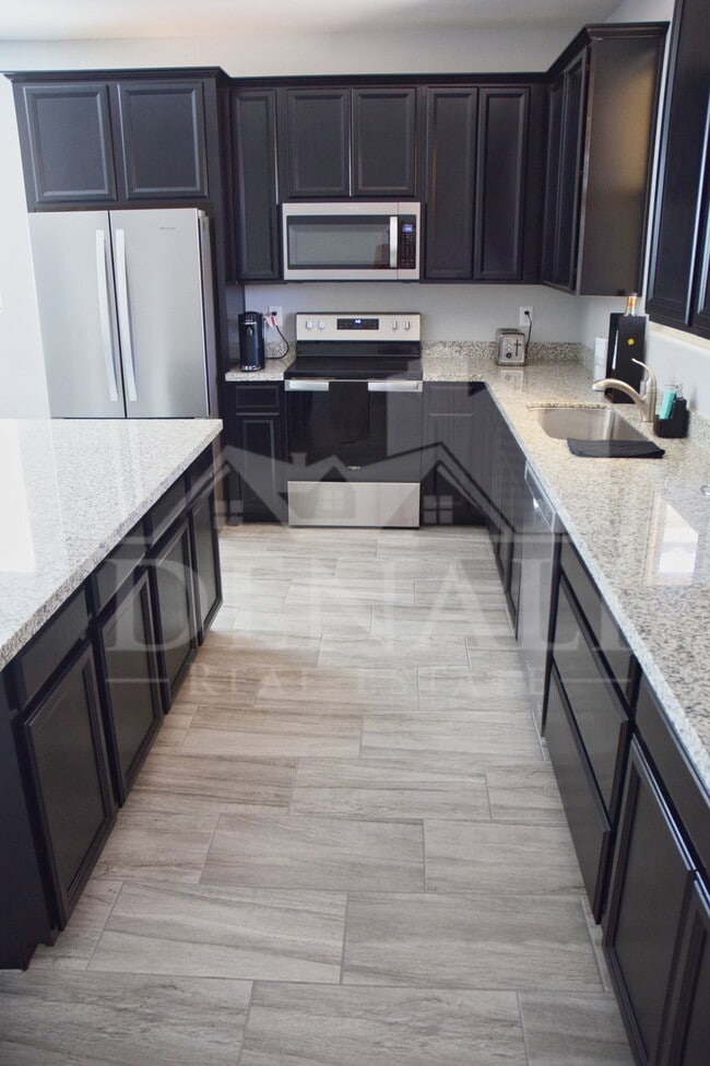 Building Photo - 8547 E Osage Ave