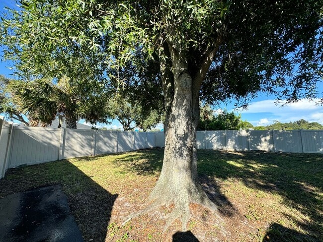 Building Photo - 2/2 with Fenced Yard, Garage and Laundry, Available Now!