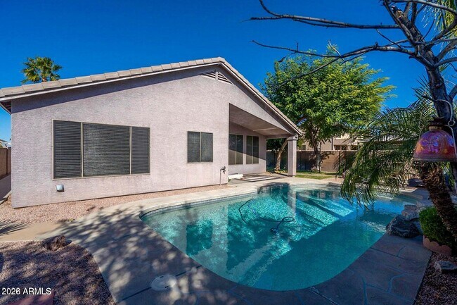 Building Photo - 9311 E Milagro Ave