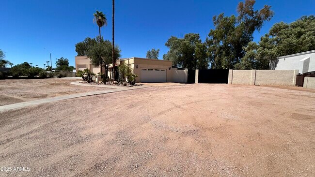 Building Photo - 7220 E Sweetwater Ave