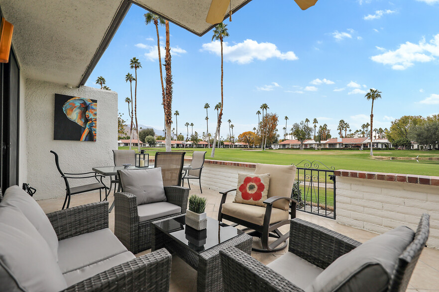 Patio with beautiful views of mountains/water and golf course - 77 Marbella Dr