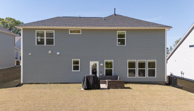 Building Photo - "Discover Spacious Living: 5-Bedroom Craftsman Home in Gated and Amenity-Rich Bretagne with Top-R...