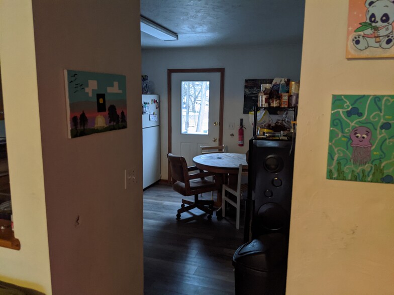 View into kitchen. The door leads to the balcony. - 3239 W Michigan Ave