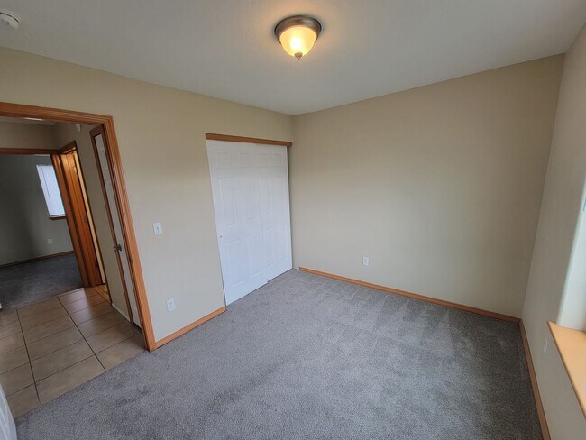 Building Photo - Comfortable 4-Bedroom Home with Fenced Bac...
