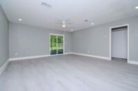 Building Photo - 2/1 Duplex with fenced backyard located in...