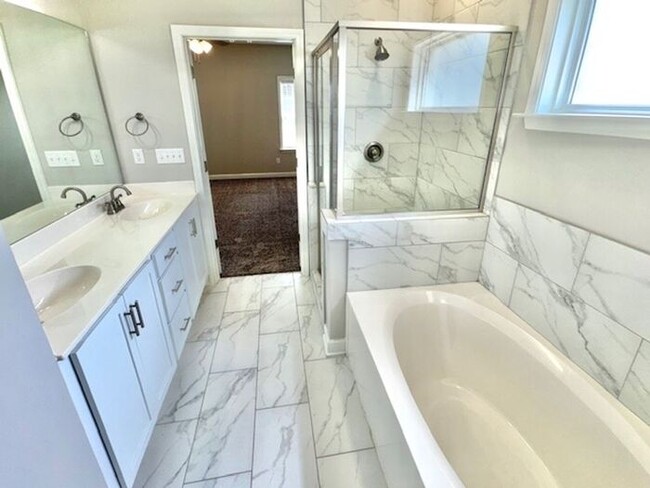 Building Photo - Now Leasing a 4-Bedroom 2.5 Bath Home in M...