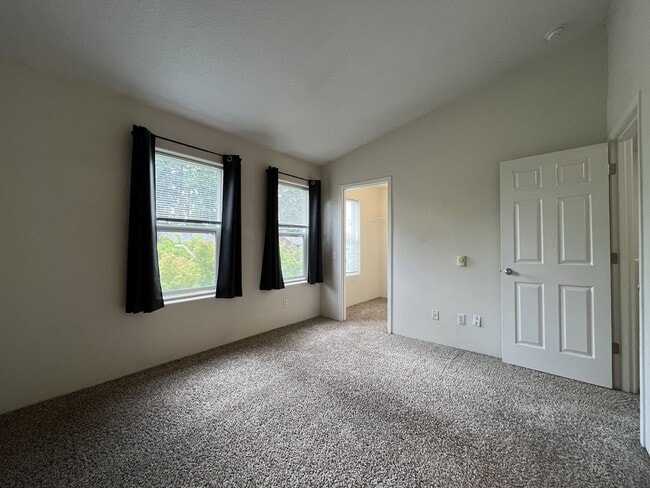 Building Photo - Spacious Three-Story Townhome Near Orenco Station with Attached Garage, Private Balcony, and Vaul...