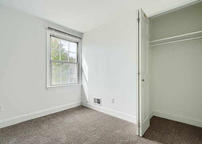 Building Photo - Updated End-of-Group Townhome with Finished Lower Level, Fenced Yard & Community Pool
