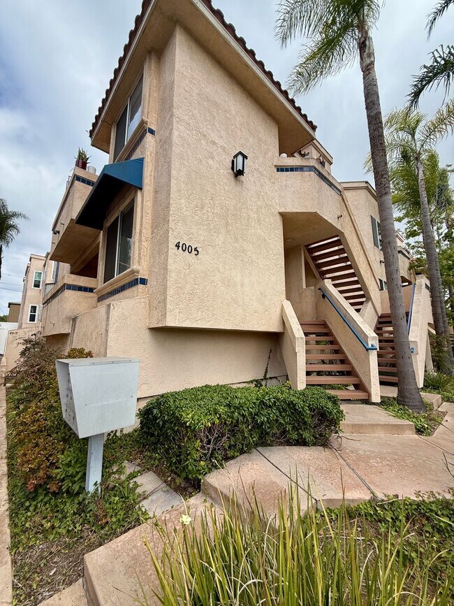 Building Photo - Spacious 2 BED 2 BATH Condo! Two-Car Tandem Garage! Central AC! In Unit Washer/Dryer!