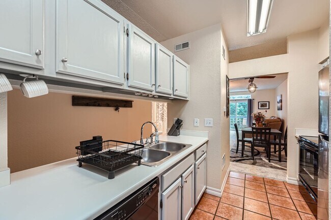Building Photo - 7430 Singing Hills Dr