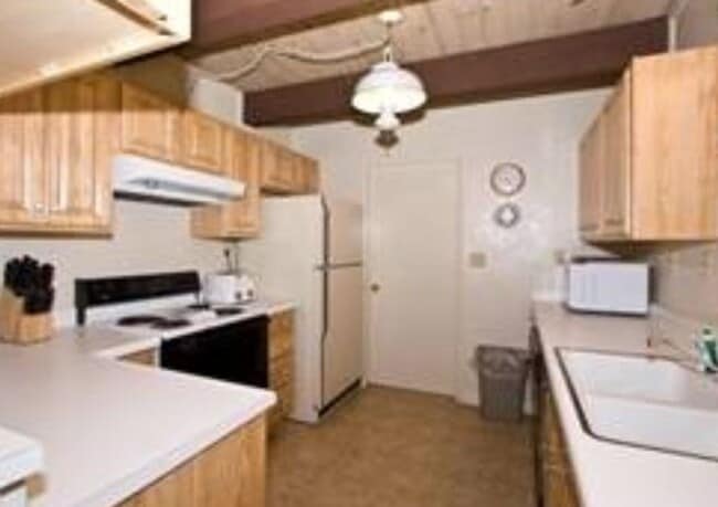 Primary Photo - Unique open design,wood beams in all rooms...