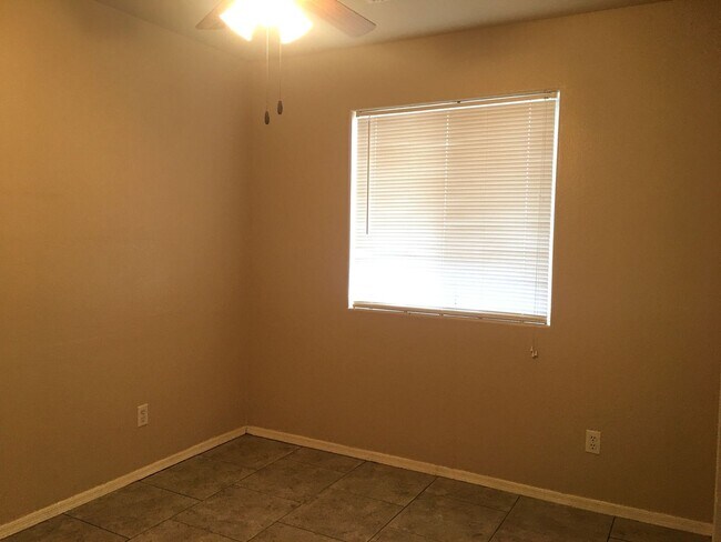 Building Photo - 3-Bedroom Single Family Home with Central Cooling, Attached Garage, and Tile Flooring