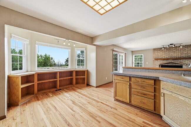 Building Photo - $2,845.95- 4-Bed /3-Bath Gem with Finished Basement and Fenced-in Yard in Colorado Springs!