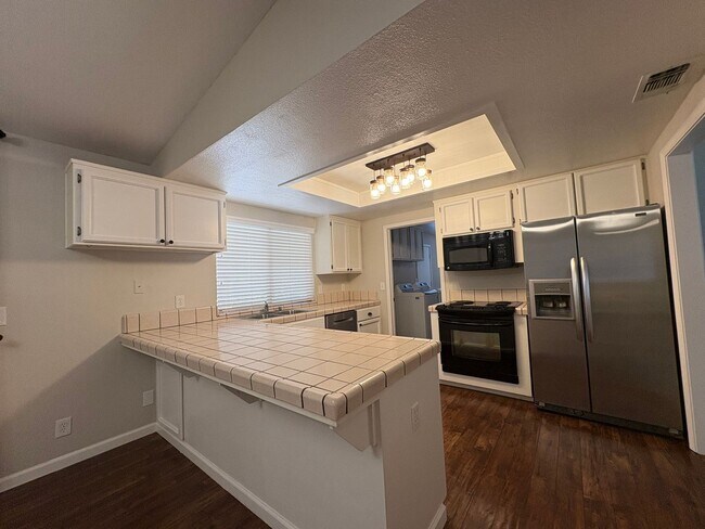 Building Photo - Your Private Escape – Charming Ranch-Style Home with Room to Breathe!