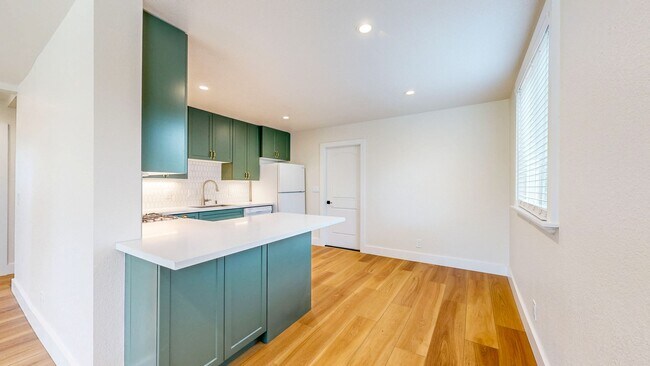 Building Photo - Bright Newly Refurbished Two Bedroom One Bath Single Family Home