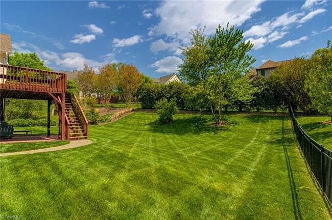 Building Photo - "Move-In Ready! Beautifully Finished 4-Bedroom Home with Fireplace, Spacious Living Areas & Deck"