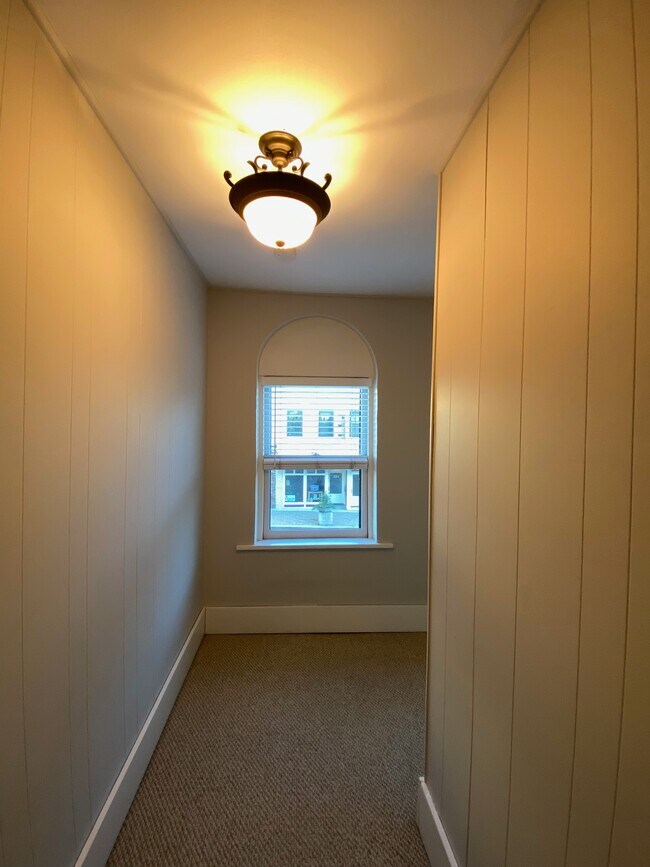 Hallway with downtown view - 225 N Franklin St