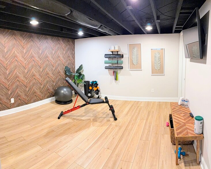 State of the art gym with weights, yoga mats, stability ball and full length mirror - 7621 Central College Rd