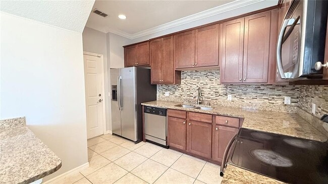 Building Photo - 6000 Wood Wind Pl