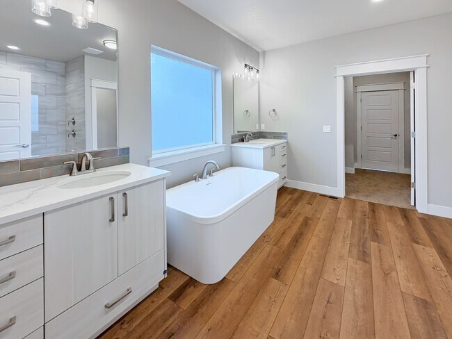 Building Photo - Brand New 4-Bedroom Home in Pheasant Meadows with 3-Car Garage Near Shopping and Dining