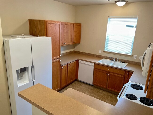 Building Photo - Charming Home in a Gated Tacoma Community – Minutes from JBLM!