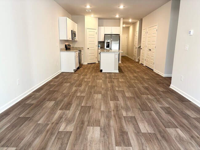 Building Photo - ABSOLUTELY BEAUTIFUL BRAND-NEW BUILD TOWNHOME