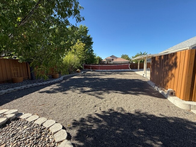 Building Photo - Beautiful 3 Bedrooms, 2 Baths with a 3 Car...