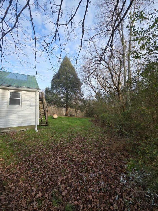 Building Photo - Remodeled 5-Bedroom Farmhouse with Modern Updates and Peaceful Country Setting in Sparta