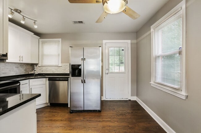 Building Photo - Move-In Ready Cape Cod with 3 Finished Levels & Huge Backyard