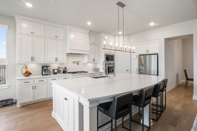 Building Photo - Stunning 4-Bedroom Luxury Residence with Bonus Office in the Prestigious Walsh Community LIKE NEW!