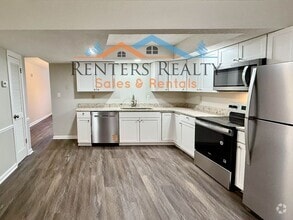 Building Photo - 2 Bedroom Condo with Private Patio