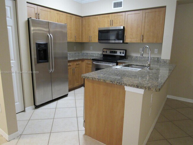Building Photo - 6505 Emerald Dunes Dr